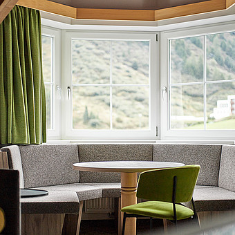 A round dining table in a flat.