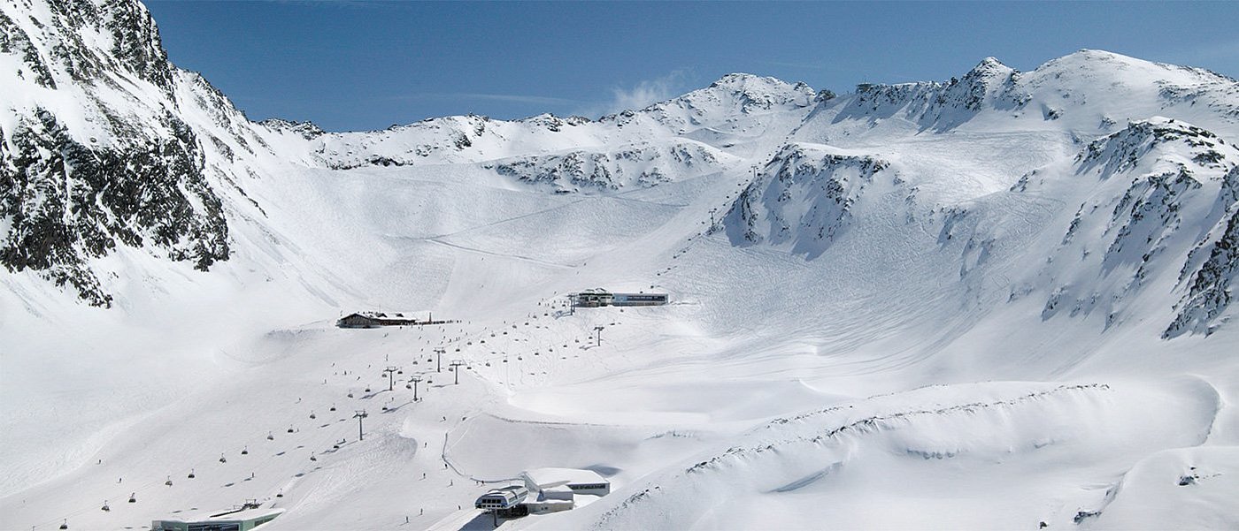 Snow-covered ski area in sunny weather