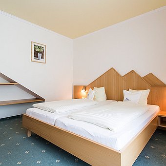 View of a large double bed.