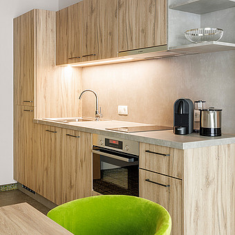 A small modern kitchen in a flat.