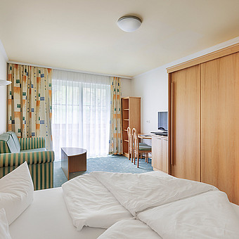 View of a cosy hotel room.